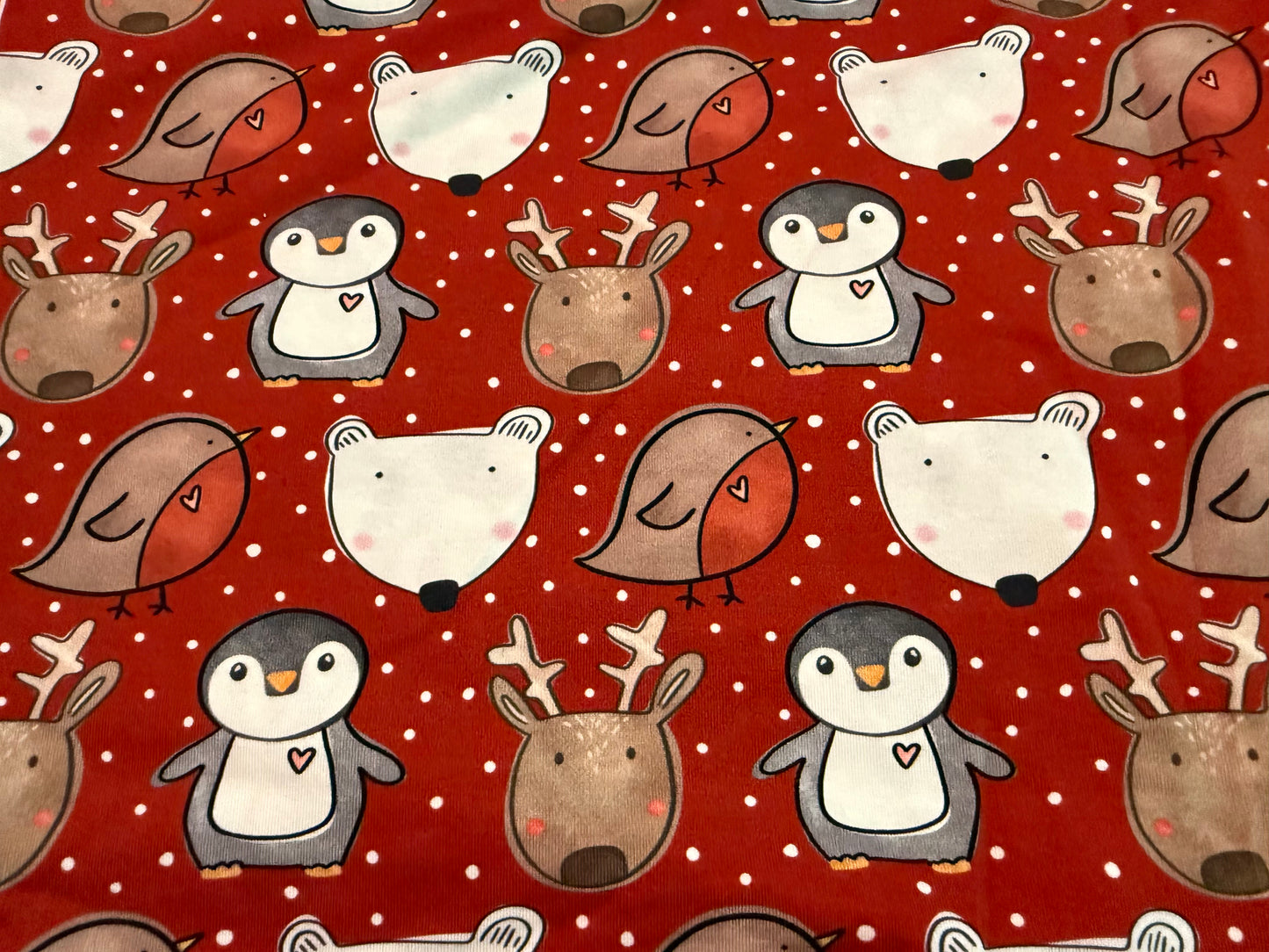 Snowy animals on red