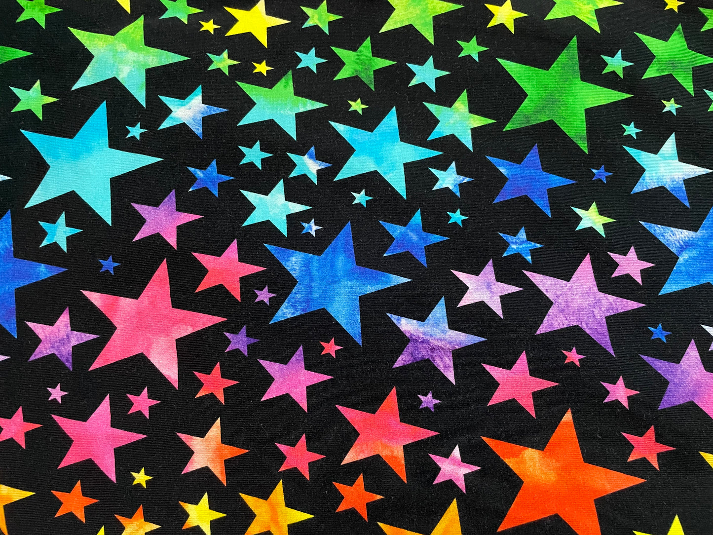 Multicoloured stars on black