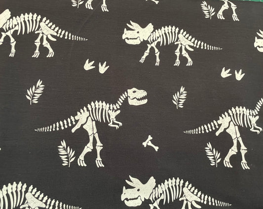 Dino skeletons on black