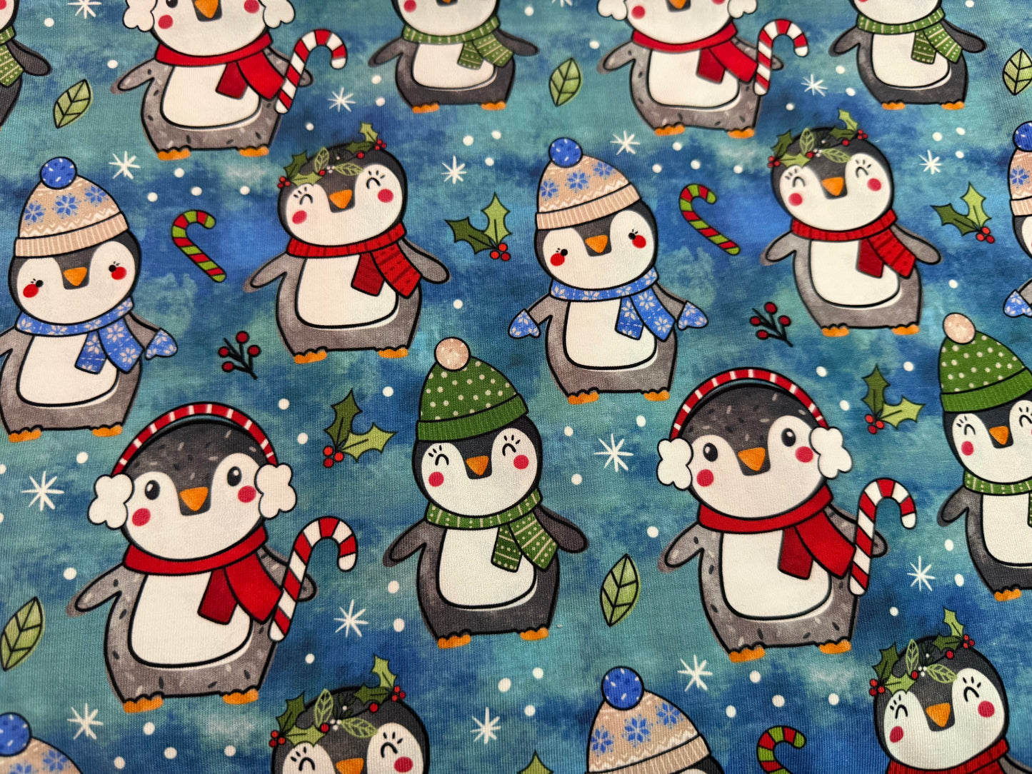 Penguins on mystic blue