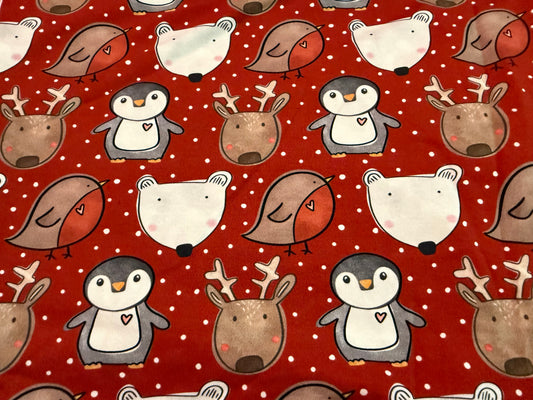 Snowy animals on red